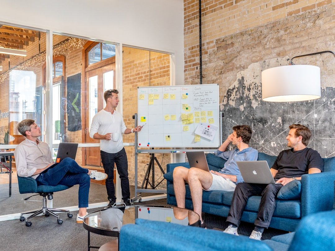 Mastering the First Impression: Your intriguing post title goes here three-men-sitting-while-using-laptops-and-watching-man-beside-whiteboard-wd1lrb9oeeo